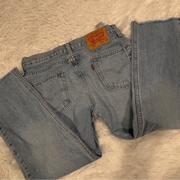 Vintage Levi's 511 Slim Fit Distressed Raw Hem Jeans Light Blue W29 - Picture 10 of 14